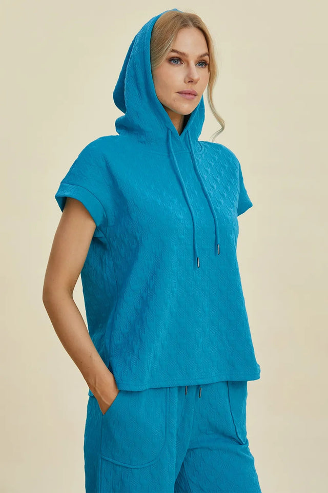 Double Take Full Size Texture Drawstring Short Sleeve Hoodie And Pocketed Pants Set