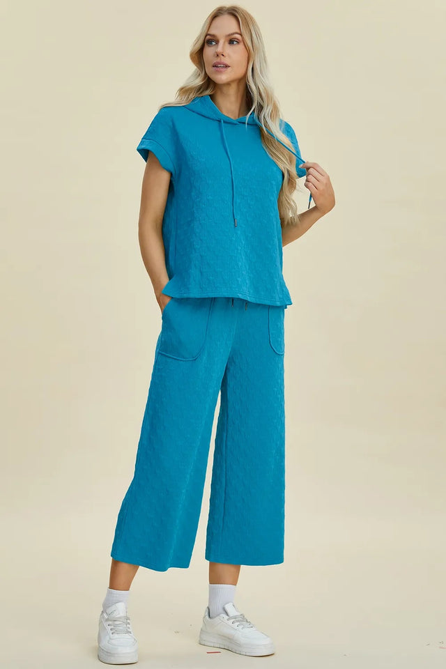 Double Take Full Size Texture Drawstring Short Sleeve Hoodie And Pocketed Pants Set