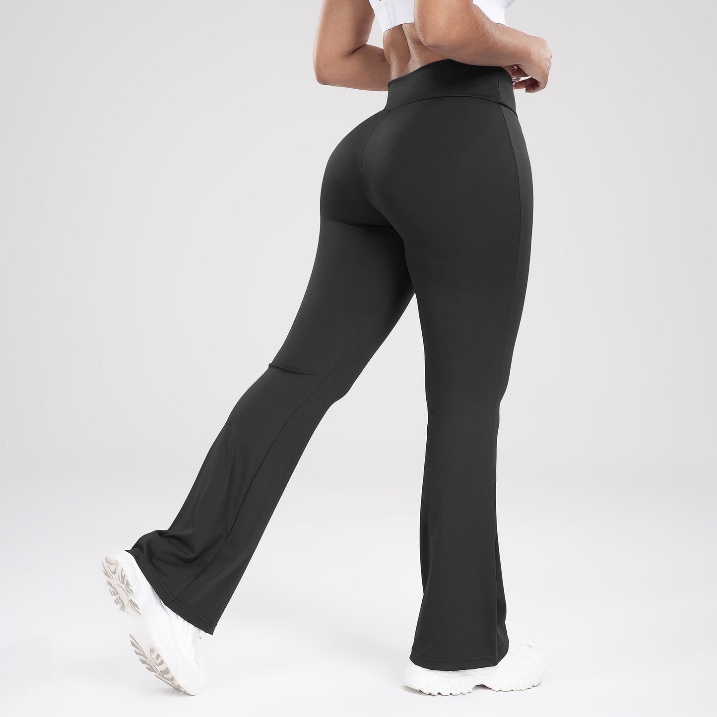 Pantalones de yoga acampanados de cintura cruzada con bolsillos laterales para deportes y ocio, de corte ajustado para mujer