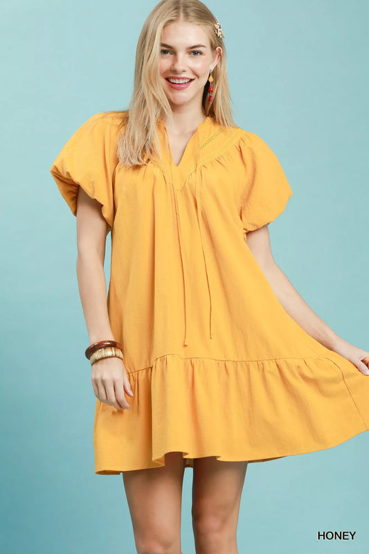 Shop Umgee Flutter Sleeve Tassel Tie Ruffle Hem Mini Dress - Women's Fashion | Akatonbo