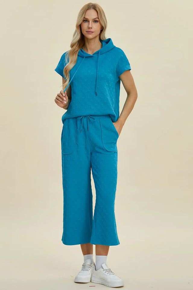 Double Take Full Size Texture Drawstring Short Sleeve Hoodie And Pocketed Pants Set
