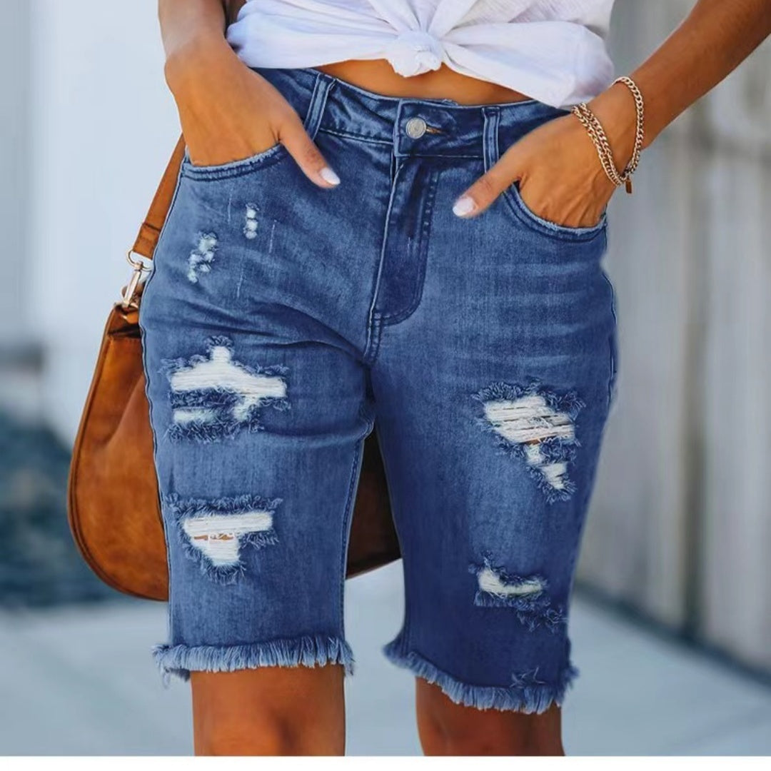 Pantalones recortados de mezclilla rasgados con borlas de talle medio ajustados de verano para mujer